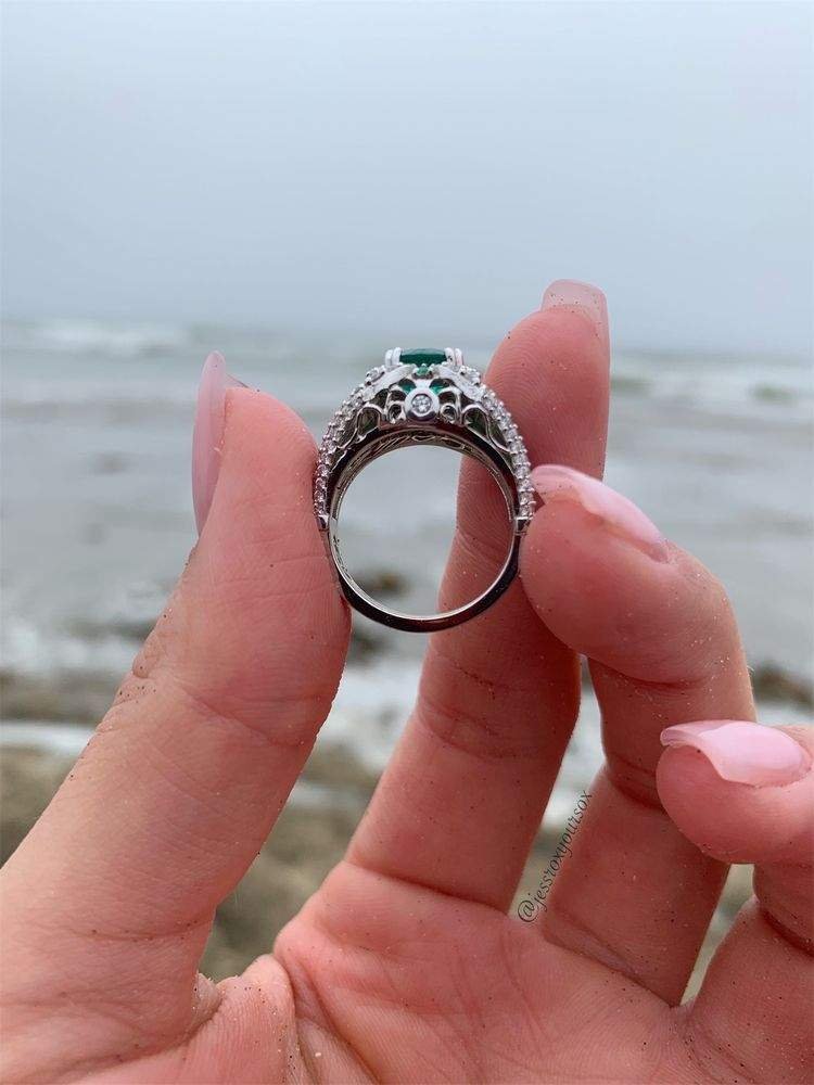 Custom emerald engagement ring with hidden engraving, designed by Kaz Jewelry fine jeweler in Laguna Niguel
