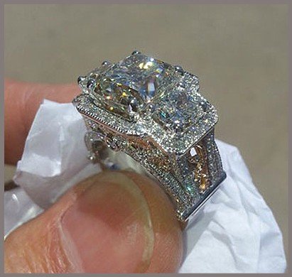 Custom engagement rings by Kaz Jewelry designed by Albert Kaz, featuring unique diamond settings and personalized ring styles for every love story.
