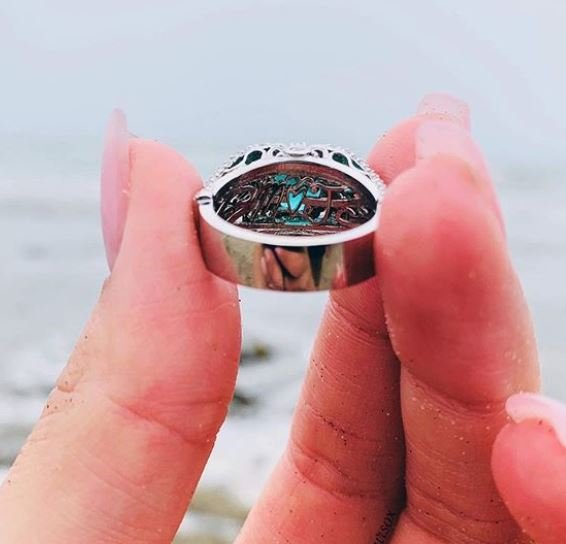 Custom engagement ring by Kaz Jewelry featuring a personalized script engraved inside the gallery, handcrafted to tell each client’s unique love story.
